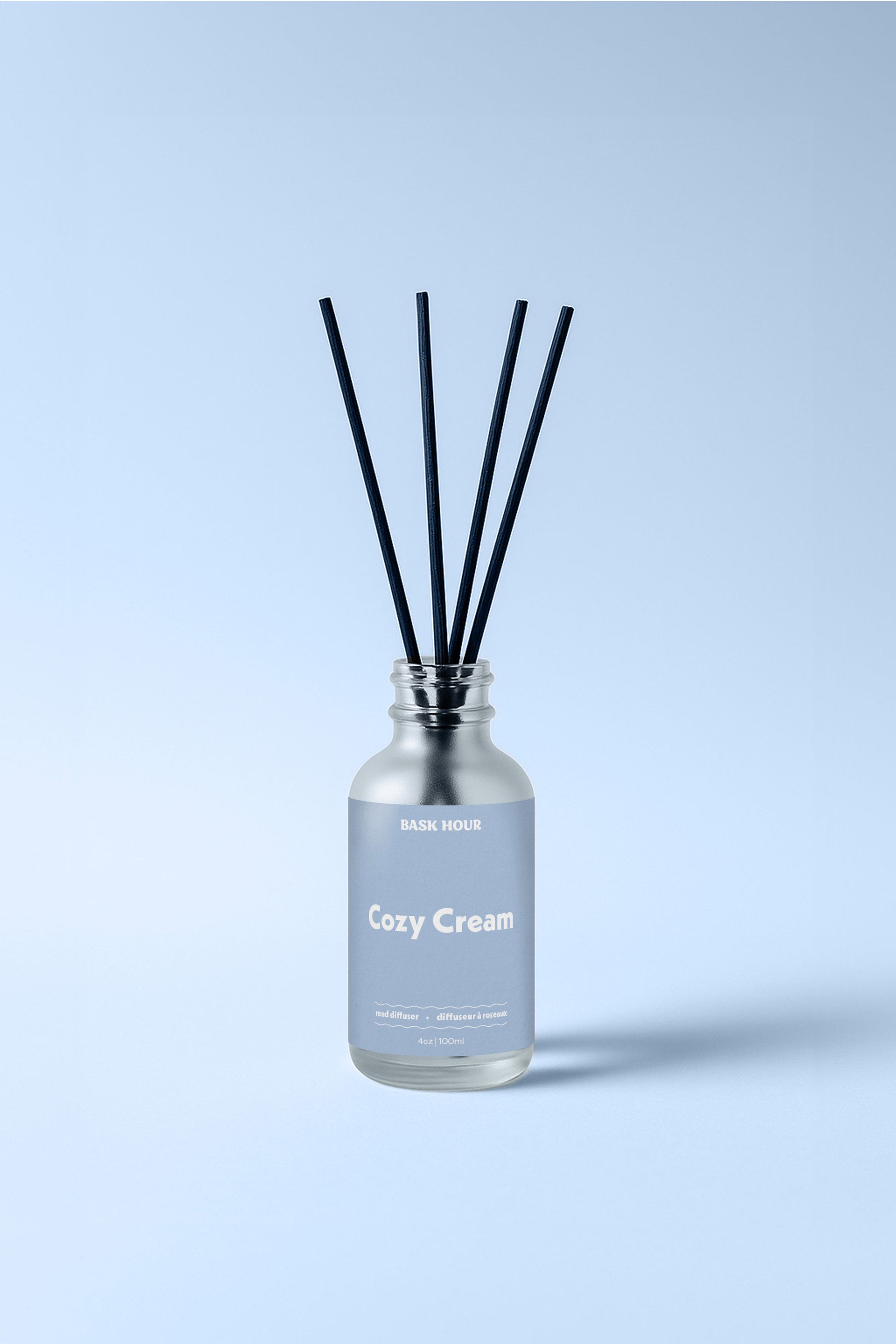 Cozy Cream reed diffuser with a blend of citrus, vanilla, and musk, providing a warm and inviting fragrance that lasts for weeks.